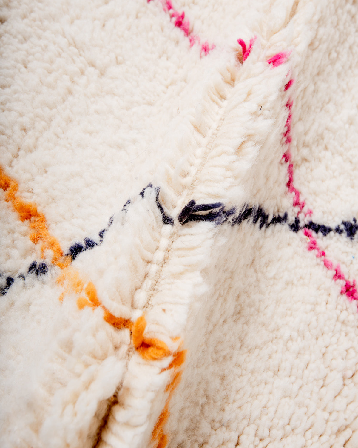 Modern, designer, handcrafted Berber rug from Morocco. Beniourain carpet with beautiful colours and patterns and fluffy wool texture.